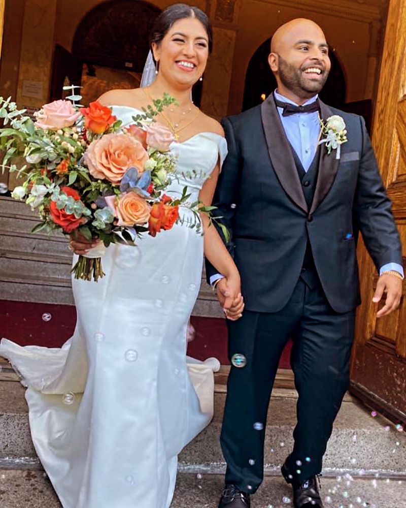 Jaise John and his wife leaving their wedding